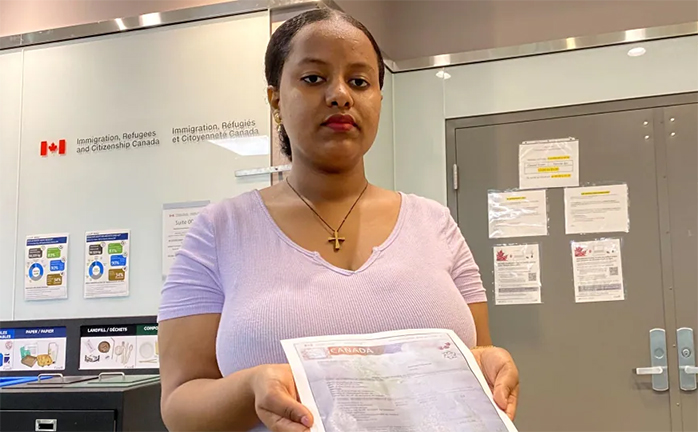 She waited 16 months for work permit, then it expired on the same day it was issued